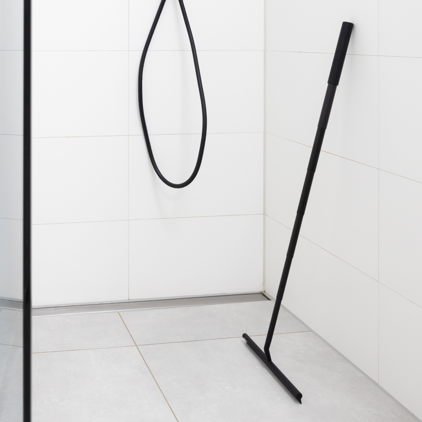 Escobilla extensible para ducha